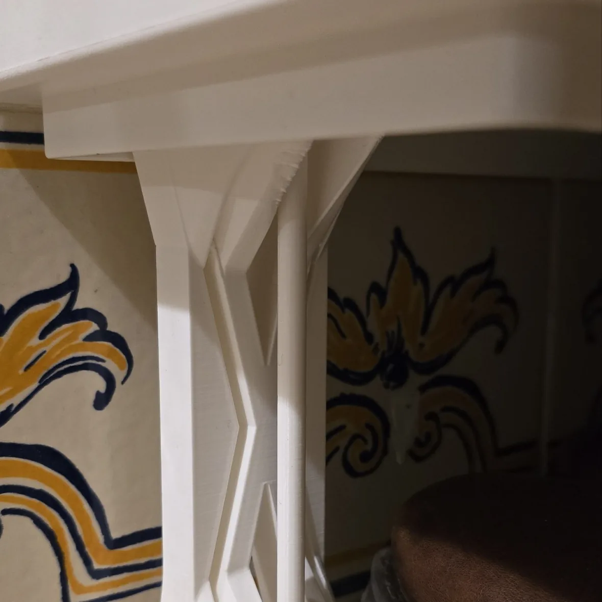 Stealth-Pillar support column in place under a white cabinet