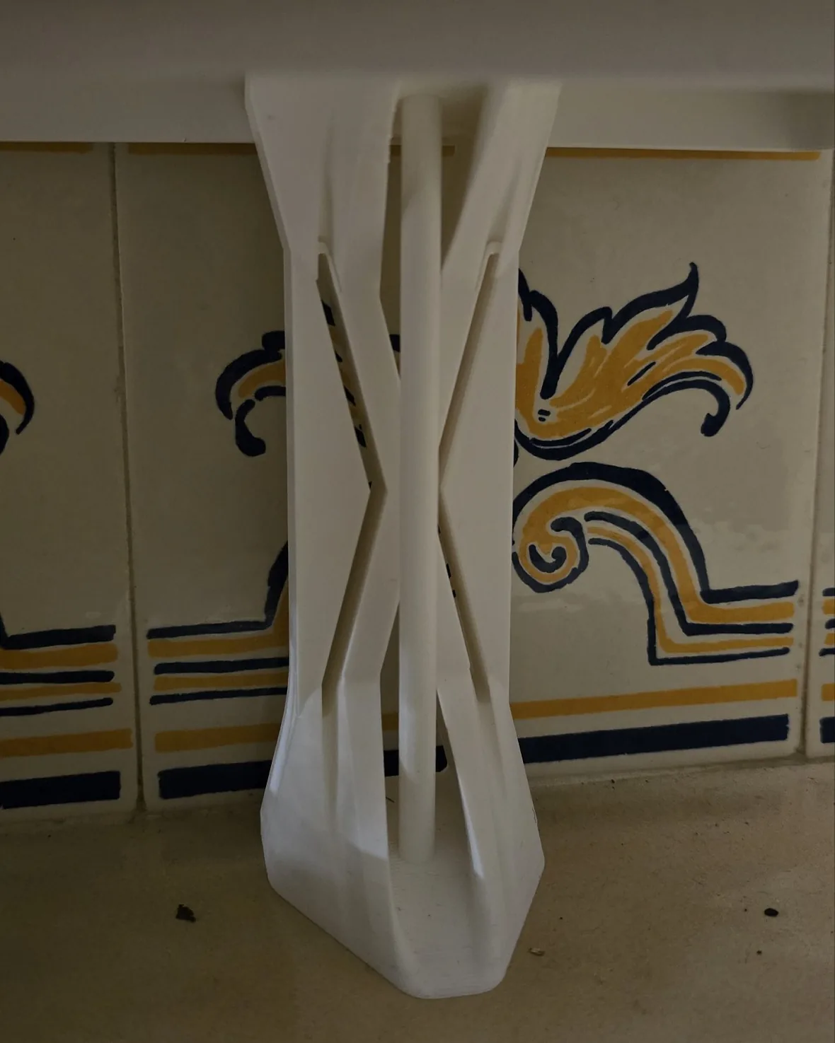 Stealth-Pillar support column in place under a white cabinet