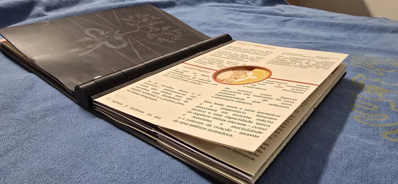 Original prototype — folded pages and circular window