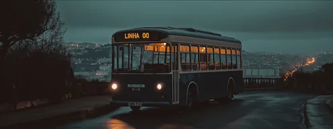 The bus at a viewpoint above the city in blue pre-dawn light