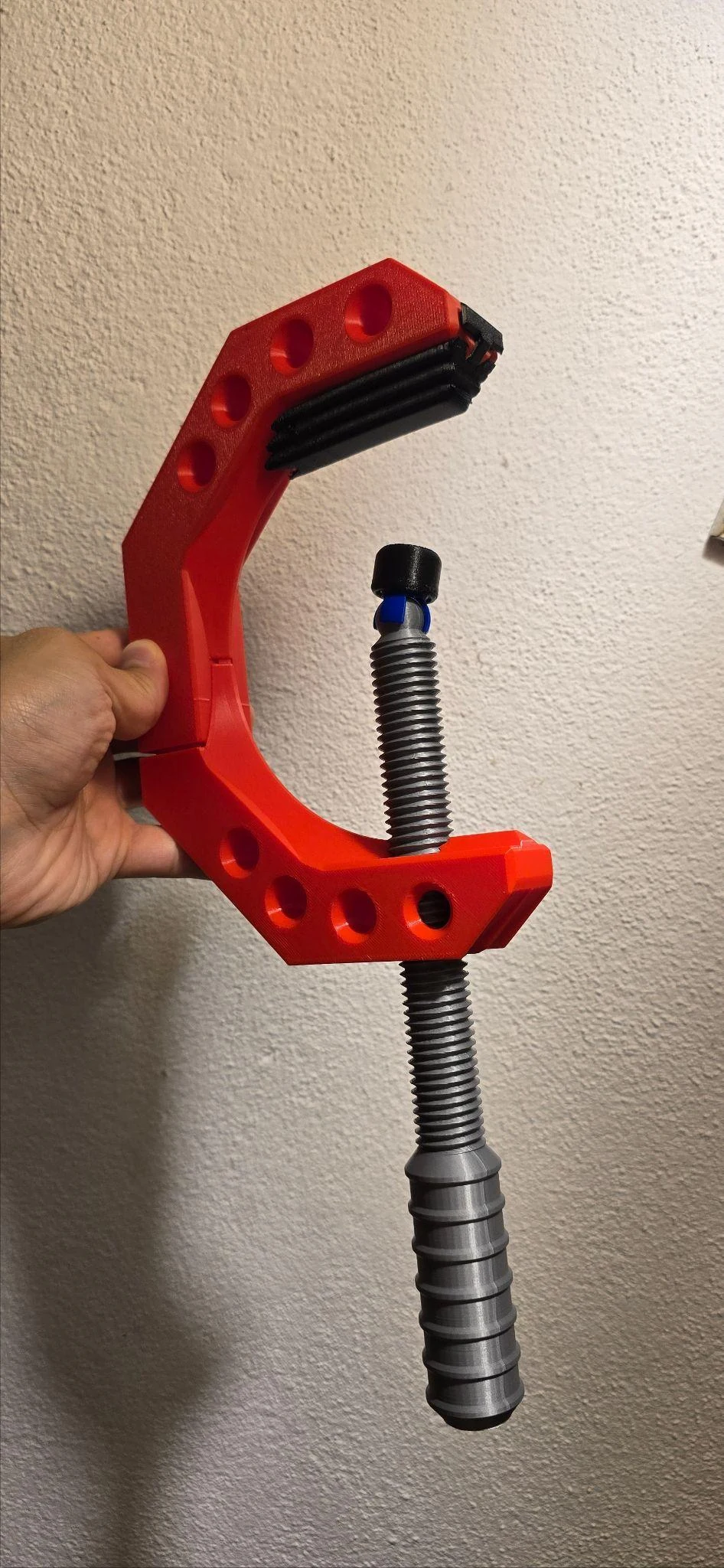 Red extendable printed clamp prototype