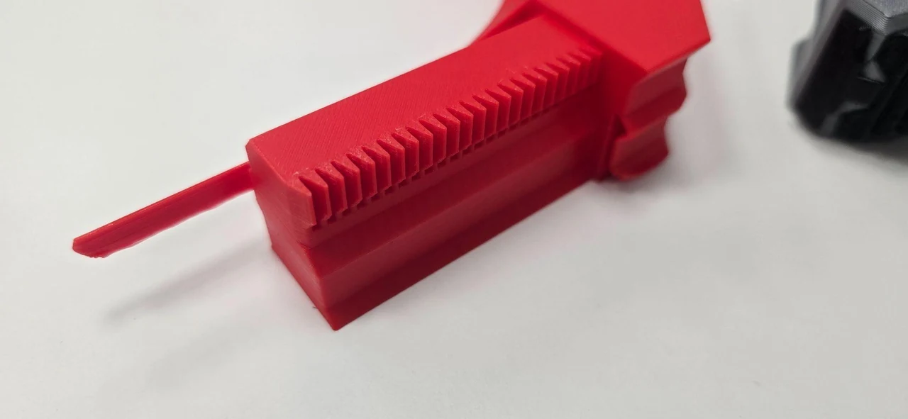 Detail of printed sliding rail and teeth